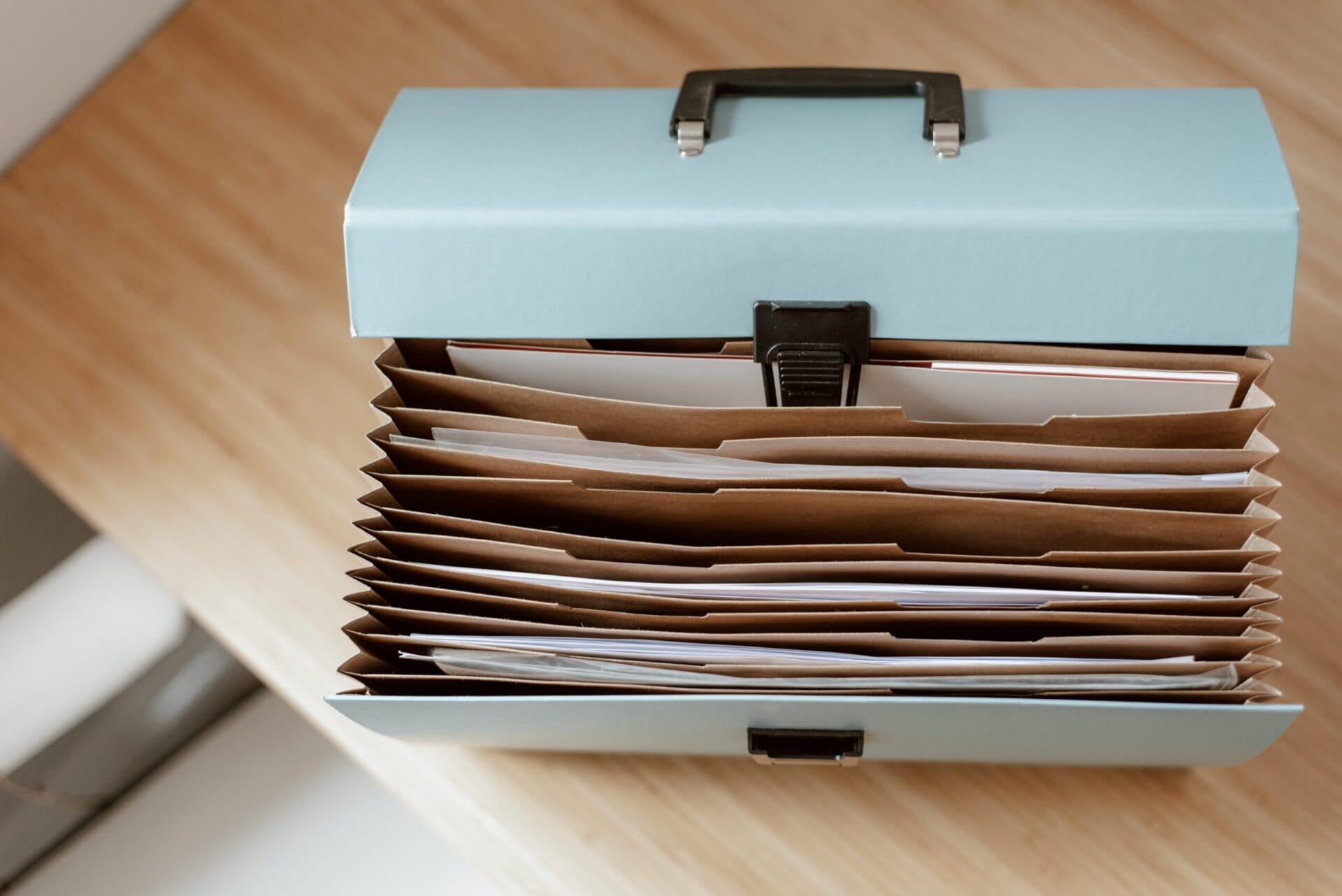 Photo by Anete Lusina: https://www.pexels.com/photo/briefcase-for-documents-placed-on-table-4792286/